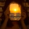 Mejor foto zona norte: "Con el Sol en la cara".  Autora: Mariana Garrido; Antofagasta.  "Sentada sobre unas rocas en el borde costero y frente al mar en plena puesta de Sol antofagastina, la cual es reflejada en un espejo". Foto tomada en marzo 2016; región de Antofagasta.